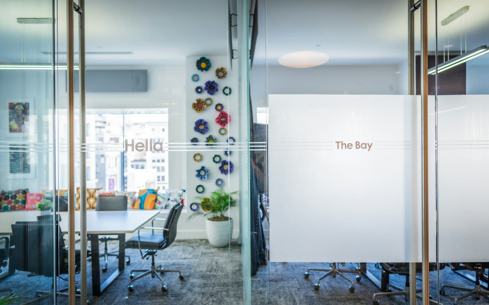 Representative modern office fit-out with glass meeting rooms